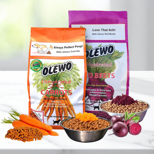 Olewo Carrots and Olewo Red Beets bags on kitchen counter behind dog food bowls and fresh vegetables next to it